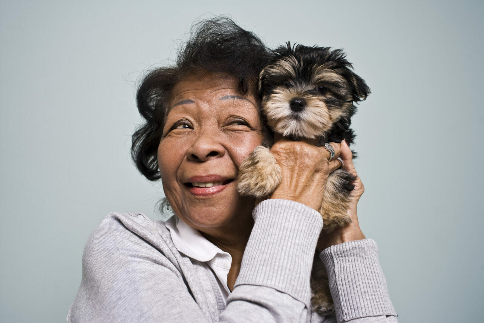 Senior Woman and a Puppy