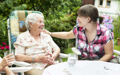 senio woman with granddaughter