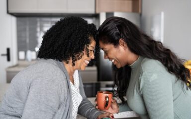 Bonding moment between mother and daughter at home