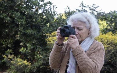 Matur woman photographing the landscape