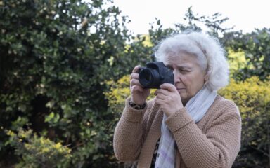 Matur woman photographing the landscape