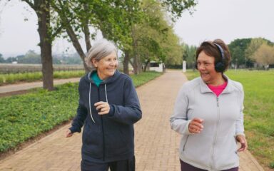 Two Senior women jogging together
